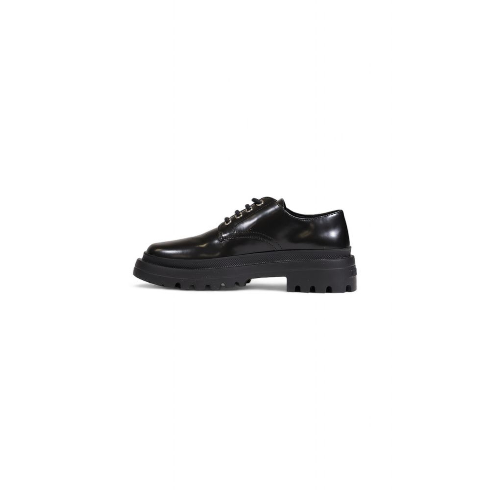 Love Flat παπούτσι από μαύρο πολυαιθυλένιο Moschino