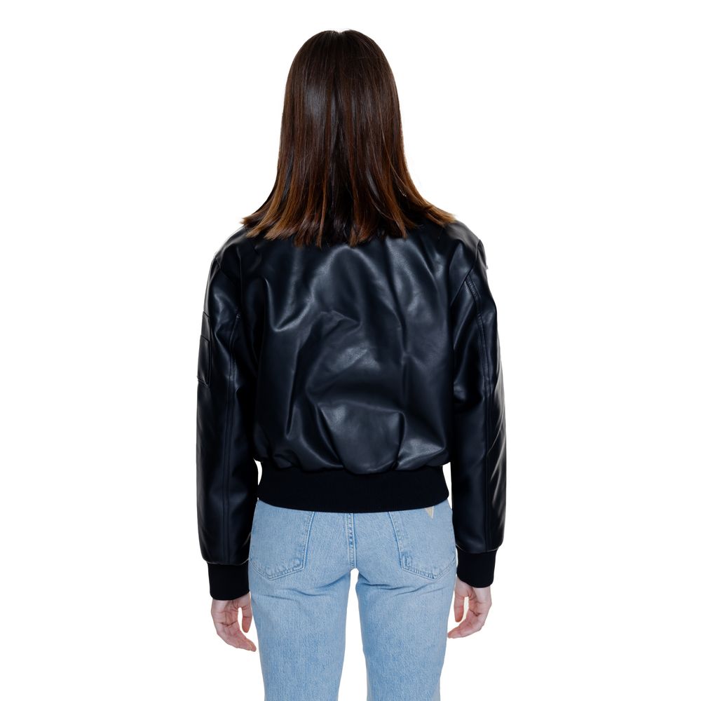 Calvin Klein Jeans Μαύρα Μπουφάν & Παλτό από Πολυαιθυλένιο